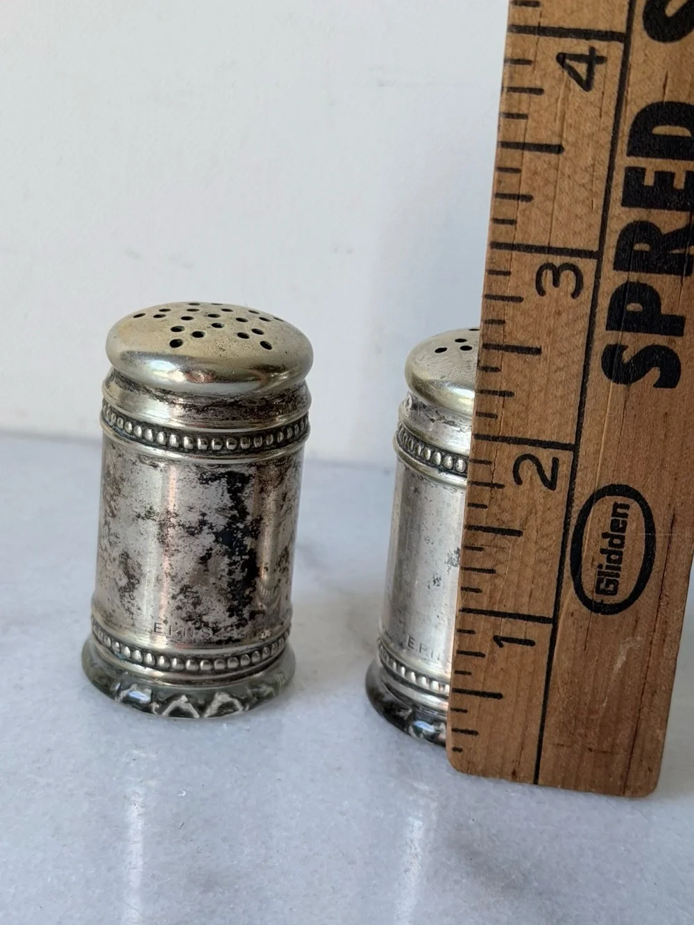 pair of antique EPNS silver salt and pepper shakers